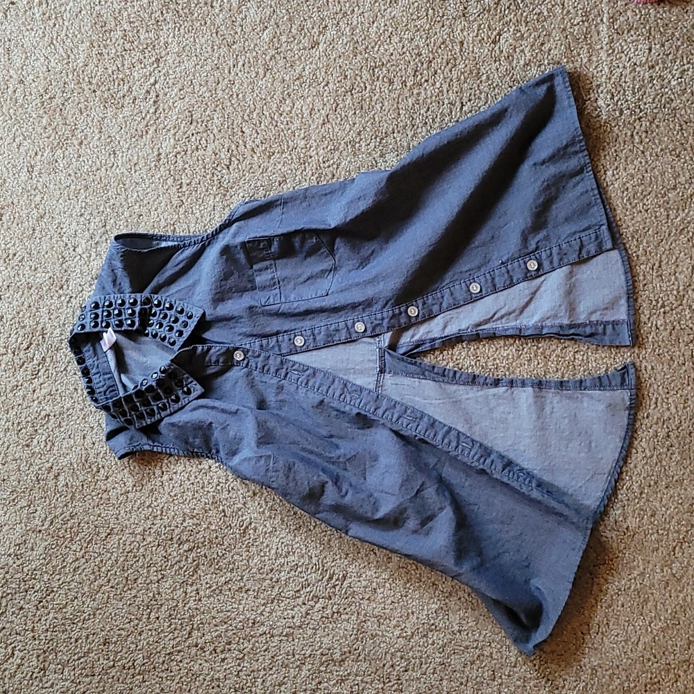 Blue sleeveless top with black studded collar